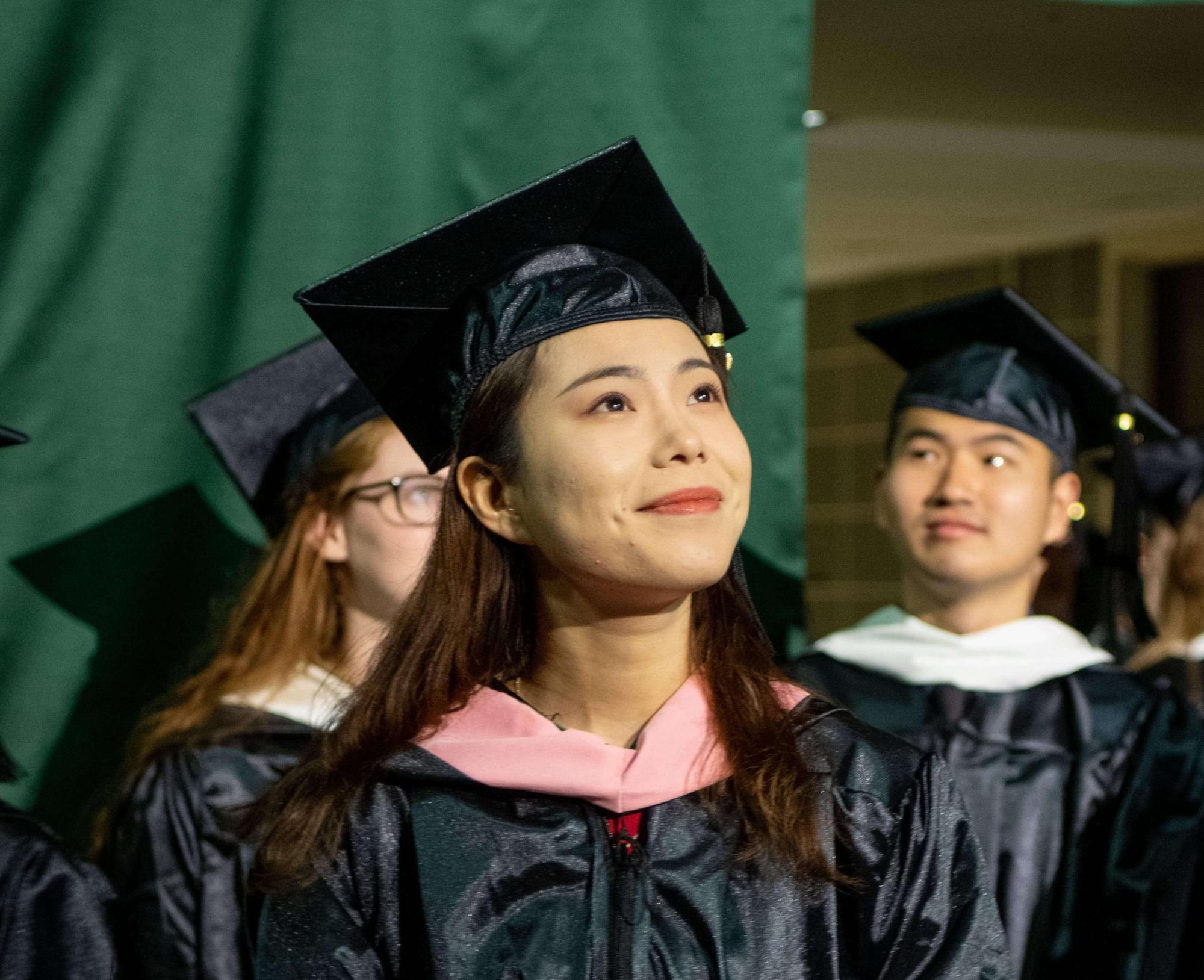 A student graduating with a Bachelor's Degree 